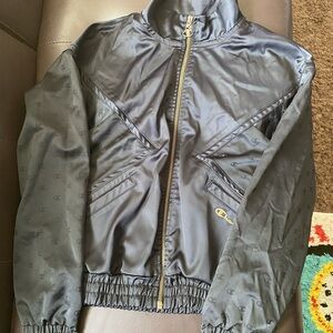 Champion Black Jacket with Gold Accents